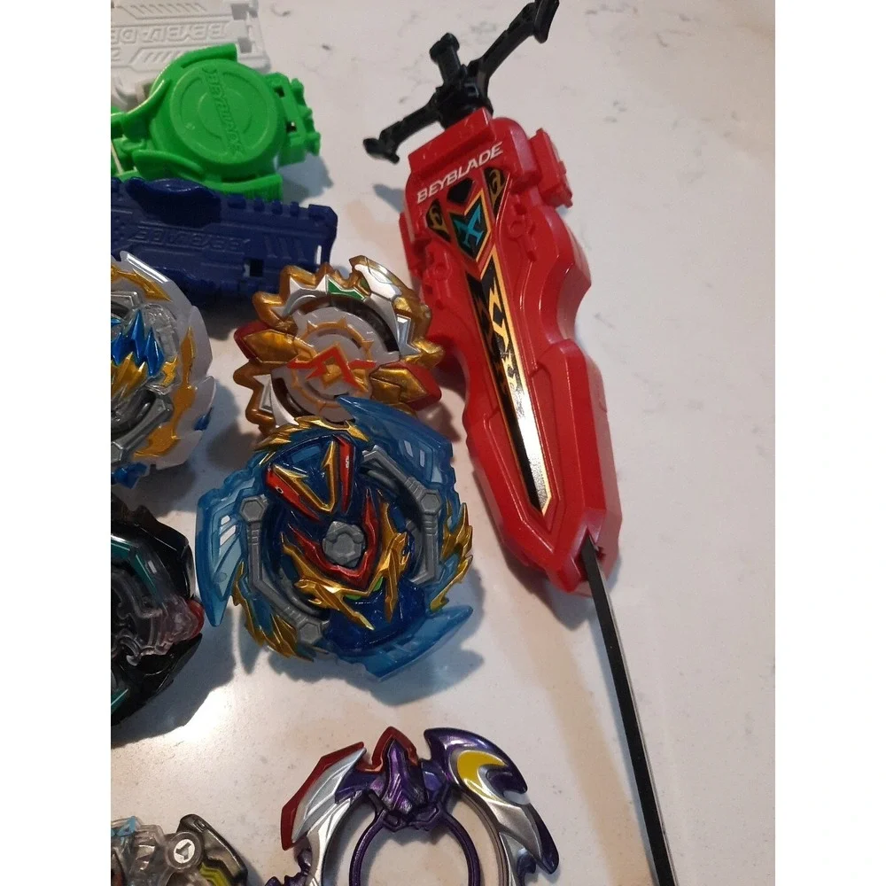 Lot Of 8 Beyblade And Different Parts